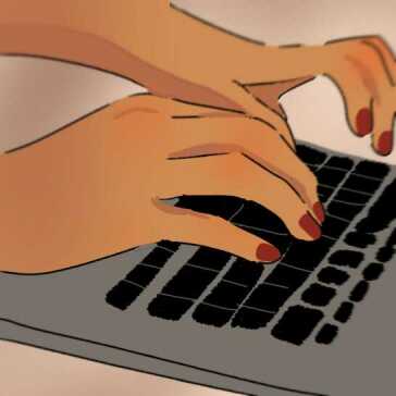 Someone typing on a laptop.