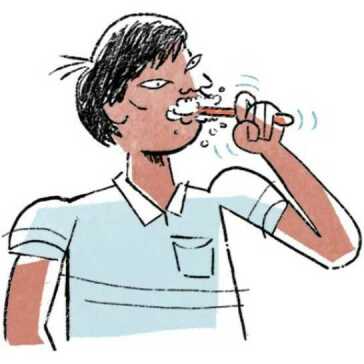 A man brushing his teeth.