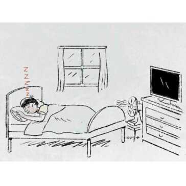 A man sleeping in bed.