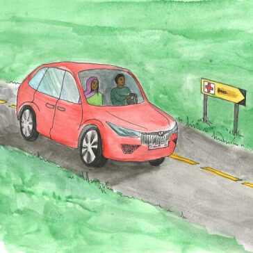 A man and woman driving.