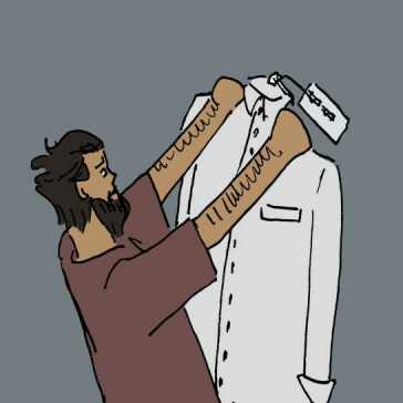 A man holding up a shirt.