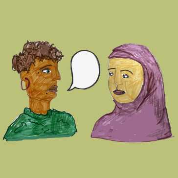 A woman talking to another woman.