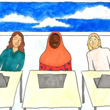 Three women sitting at desks.