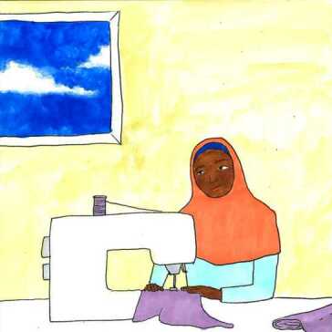 A woman using a sewing machine.